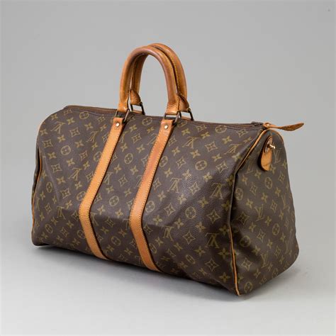 lv fiber keepall costo|keepall purse.